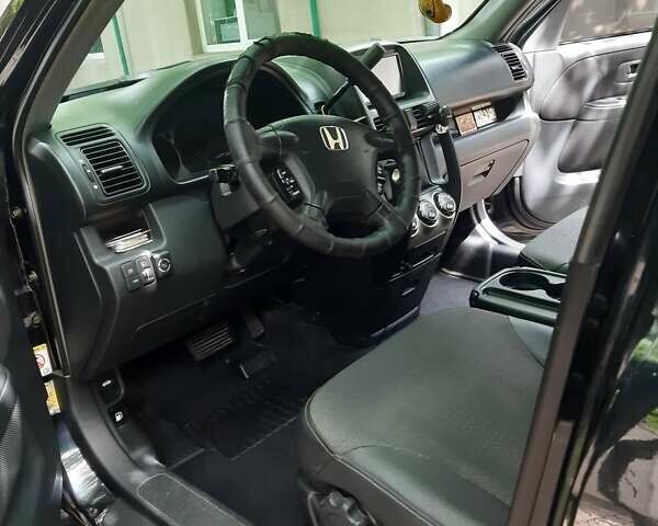 Черный Хонда СРВ, объемом двигателя 2 л и пробегом 316 тыс. км за 8200 $, фото 29 на Automoto.ua