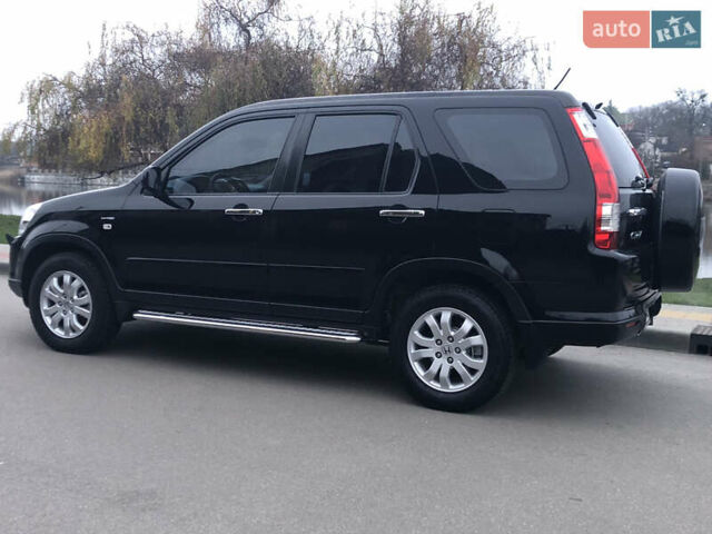 Чорний Хонда СРВ, об'ємом двигуна 2 л та пробігом 97 тис. км за 11200 $, фото 8 на Automoto.ua