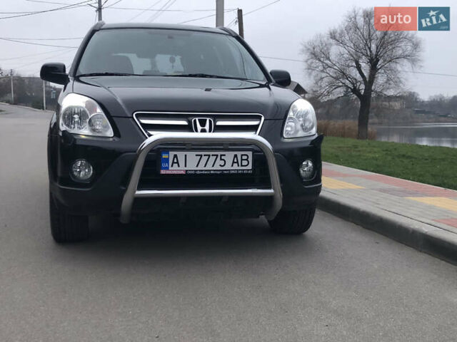 Чорний Хонда СРВ, об'ємом двигуна 2 л та пробігом 97 тис. км за 11200 $, фото 21 на Automoto.ua