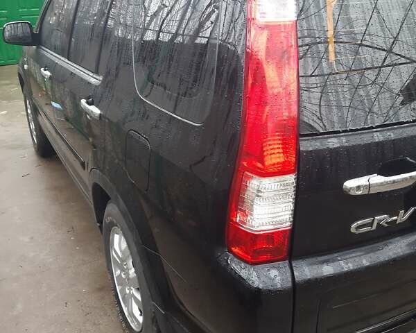 Черный Хонда СРВ, объемом двигателя 2 л и пробегом 316 тыс. км за 8200 $, фото 37 на Automoto.ua