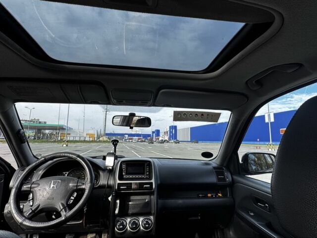 Черный Хонда СРВ, объемом двигателя 2 л и пробегом 290 тыс. км за 4700 $, фото 2 на Automoto.ua