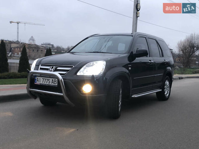 Чорний Хонда СРВ, об'ємом двигуна 2 л та пробігом 97 тис. км за 11200 $, фото 13 на Automoto.ua