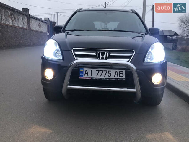 Чорний Хонда СРВ, об'ємом двигуна 2 л та пробігом 97 тис. км за 11200 $, фото 17 на Automoto.ua