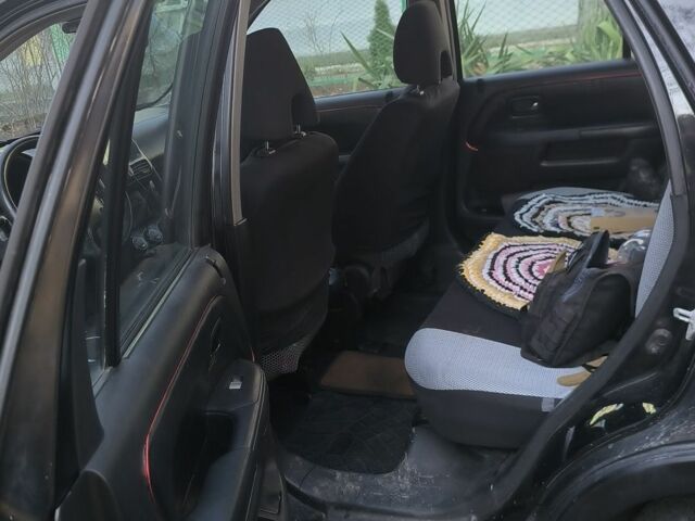 Чорний Хонда СРВ, об'ємом двигуна 2 л та пробігом 281 тис. км за 4500 $, фото 14 на Automoto.ua