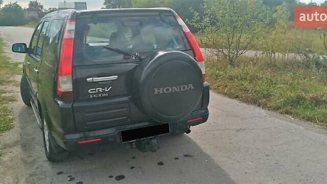 Черный Хонда СРВ, объемом двигателя 2.2 л и пробегом 302 тыс. км за 4600 $, фото 3 на Automoto.ua