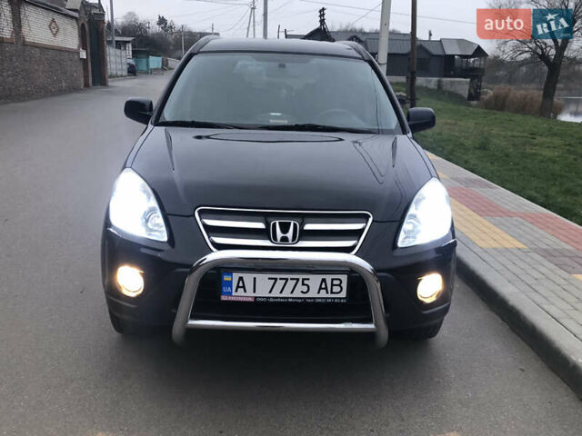 Чорний Хонда СРВ, об'ємом двигуна 2 л та пробігом 97 тис. км за 11200 $, фото 16 на Automoto.ua