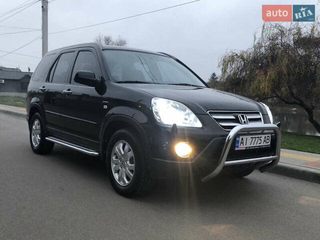 Чорний Хонда СРВ, об'ємом двигуна 2 л та пробігом 97 тис. км за 11200 $, фото 10 на Automoto.ua