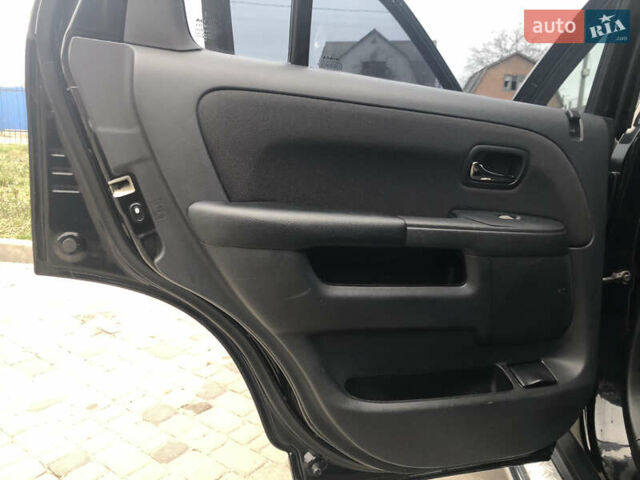 Чорний Хонда СРВ, об'ємом двигуна 2 л та пробігом 97 тис. км за 11200 $, фото 69 на Automoto.ua