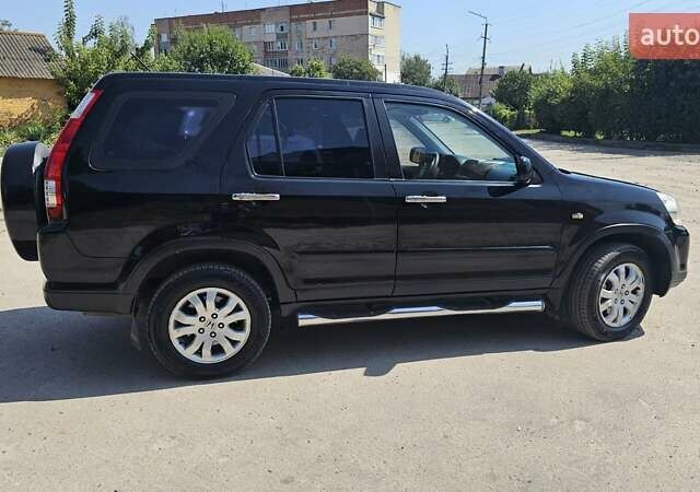 Черный Хонда СРВ, объемом двигателя 2 л и пробегом 253 тыс. км за 6300 $, фото 3 на Automoto.ua