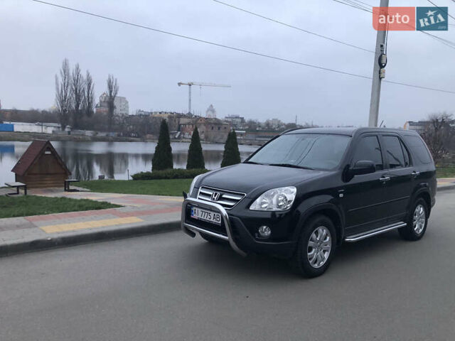 Чорний Хонда СРВ, об'ємом двигуна 2 л та пробігом 97 тис. км за 11200 $, фото 1 на Automoto.ua