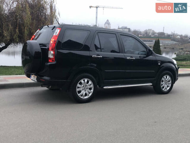 Чорний Хонда СРВ, об'ємом двигуна 2 л та пробігом 97 тис. км за 11200 $, фото 28 на Automoto.ua