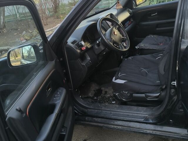 Чорний Хонда СРВ, об'ємом двигуна 2 л та пробігом 281 тис. км за 4500 $, фото 7 на Automoto.ua