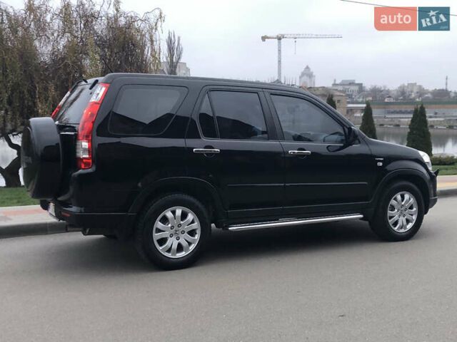 Чорний Хонда СРВ, об'ємом двигуна 2 л та пробігом 97 тис. км за 11200 $, фото 29 на Automoto.ua