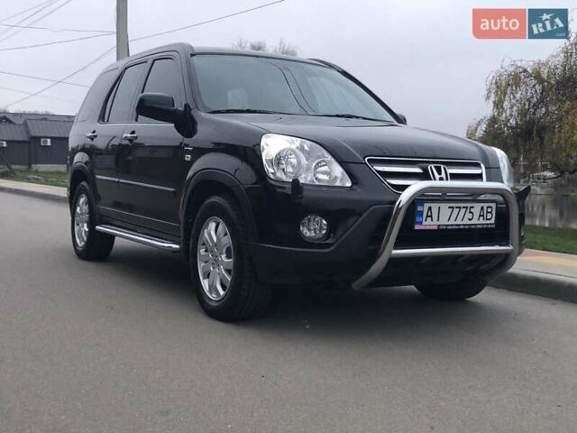 Чорний Хонда СРВ, об'ємом двигуна 2 л та пробігом 97 тис. км за 11200 $, фото 20 на Automoto.ua