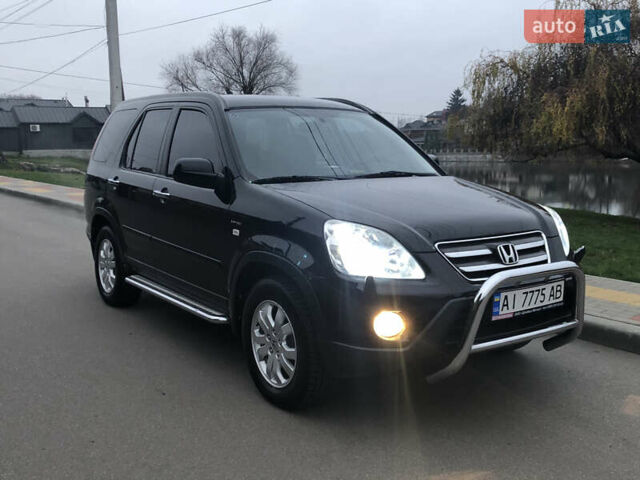 Чорний Хонда СРВ, об'ємом двигуна 2 л та пробігом 97 тис. км за 11200 $, фото 15 на Automoto.ua