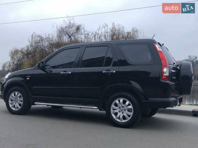 Чорний Хонда СРВ, об'ємом двигуна 2 л та пробігом 97 тис. км за 11200 $, фото 5 на Automoto.ua