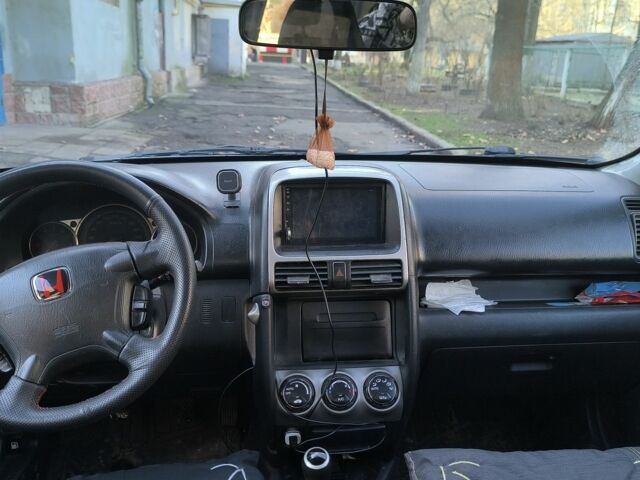 Чорний Хонда СРВ, об'ємом двигуна 2 л та пробігом 281 тис. км за 4500 $, фото 11 на Automoto.ua