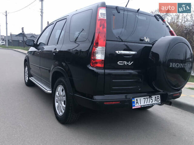 Чорний Хонда СРВ, об'ємом двигуна 2 л та пробігом 97 тис. км за 11200 $, фото 35 на Automoto.ua