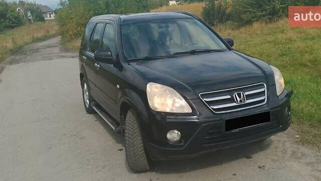 Черный Хонда СРВ, объемом двигателя 2.2 л и пробегом 302 тыс. км за 4600 $, фото 1 на Automoto.ua