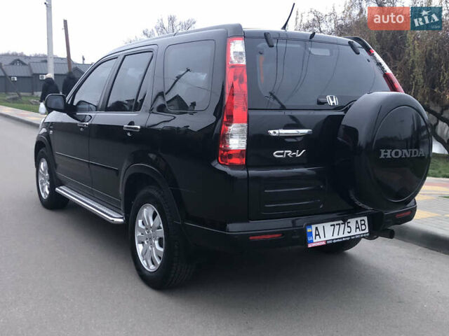 Чорний Хонда СРВ, об'ємом двигуна 2 л та пробігом 97 тис. км за 11200 $, фото 9 на Automoto.ua