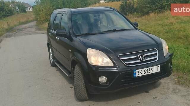 Чорний Хонда СРВ, об'ємом двигуна 2.2 л та пробігом 303 тис. км за 3600 $, фото 5 на Automoto.ua