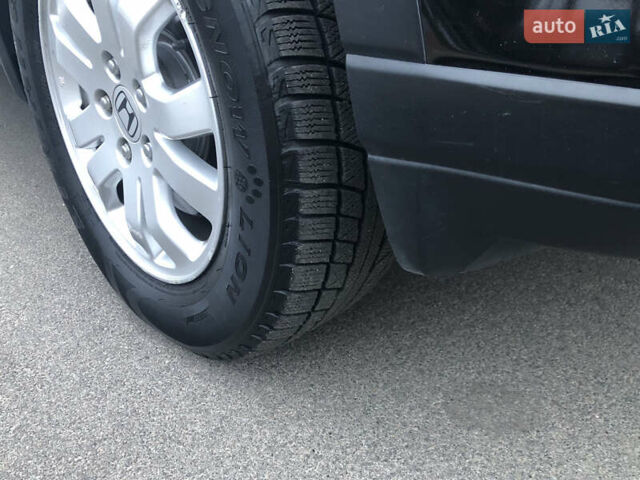 Чорний Хонда СРВ, об'ємом двигуна 2 л та пробігом 97 тис. км за 11200 $, фото 44 на Automoto.ua