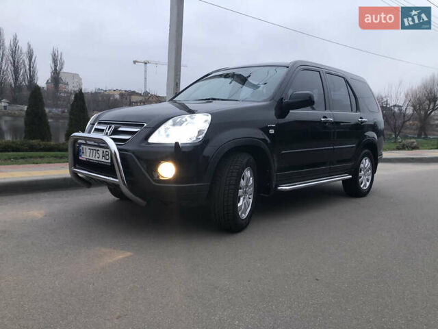 Чорний Хонда СРВ, об'ємом двигуна 2 л та пробігом 97 тис. км за 11200 $, фото 11 на Automoto.ua