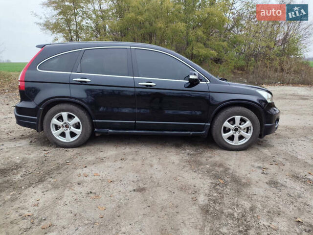 Чорний Хонда СРВ, об'ємом двигуна 2 л та пробігом 276 тис. км за 10300 $, фото 5 на Automoto.ua