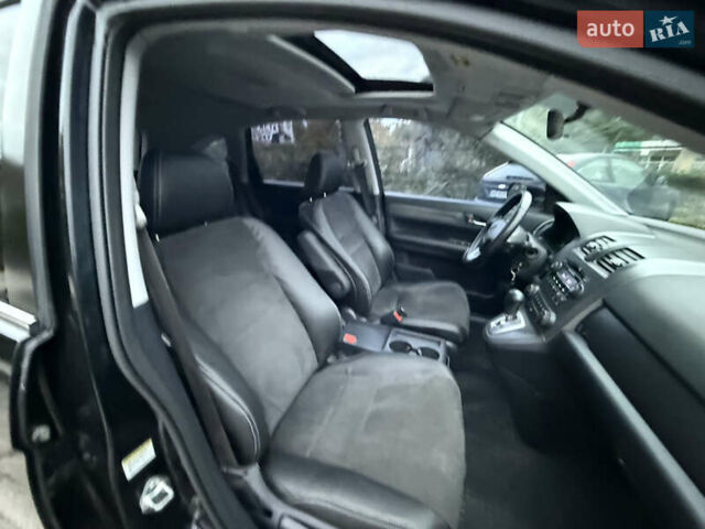 Черный Хонда СРВ, объемом двигателя 2.35 л и пробегом 124 тыс. км за 12000 $, фото 23 на Automoto.ua