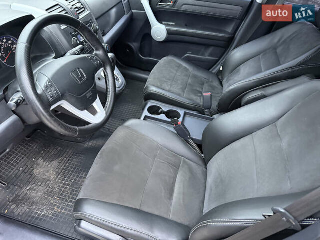 Черный Хонда СРВ, объемом двигателя 2.35 л и пробегом 124 тыс. км за 12000 $, фото 7 на Automoto.ua