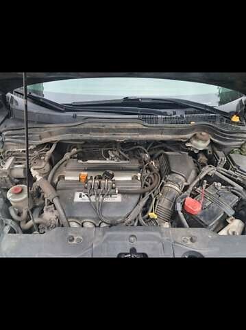 Черный Хонда СРВ, объемом двигателя 2.4 л и пробегом 370 тыс. км за 10000 $, фото 4 на Automoto.ua