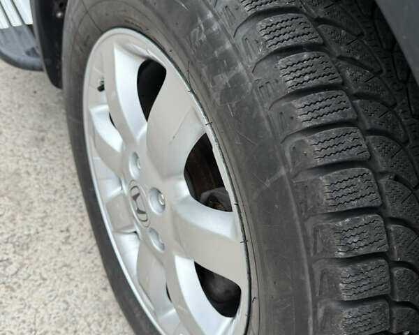 Черный Хонда СРВ, объемом двигателя 2.35 л и пробегом 124 тыс. км за 12000 $, фото 1 на Automoto.ua