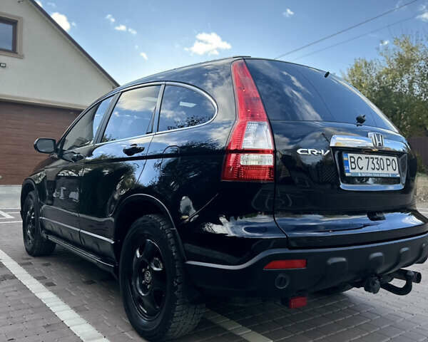 Черный Хонда СРВ, объемом двигателя 2.4 л и пробегом 257 тыс. км за 7950 $, фото 6 на Automoto.ua