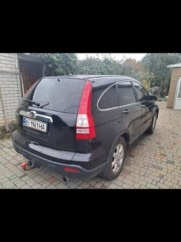 Черный Хонда СРВ, объемом двигателя 2.4 л и пробегом 370 тыс. км за 10000 $, фото 1 на Automoto.ua