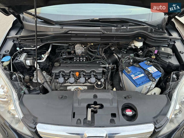 Черный Хонда СРВ, объемом двигателя 2 л и пробегом 173 тыс. км за 9900 $, фото 5 на Automoto.ua