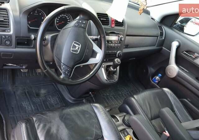 Черный Хонда СРВ, объемом двигателя 2.2 л и пробегом 310 тыс. км за 10950 $, фото 5 на Automoto.ua