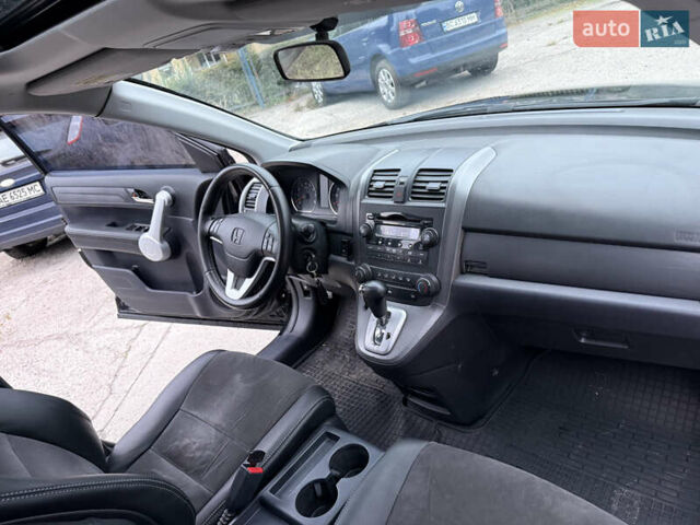 Черный Хонда СРВ, объемом двигателя 2.35 л и пробегом 124 тыс. км за 12000 $, фото 12 на Automoto.ua