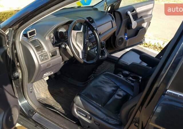 Черный Хонда СРВ, объемом двигателя 2.2 л и пробегом 310 тыс. км за 10950 $, фото 4 на Automoto.ua