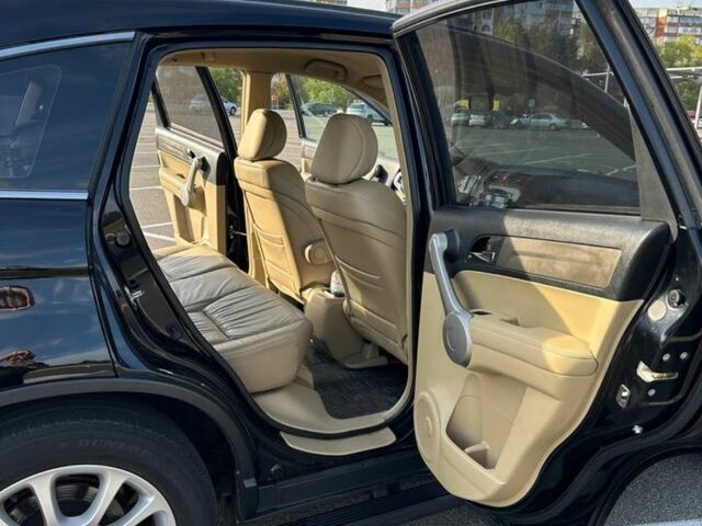 Черный Хонда СРВ, объемом двигателя 2 л и пробегом 207 тыс. км за 10950 $, фото 1 на Automoto.ua