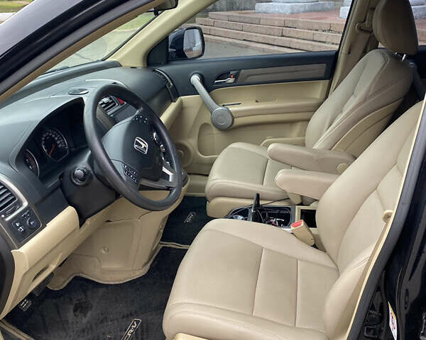 Черный Хонда СРВ, объемом двигателя 2.35 л и пробегом 245 тыс. км за 9700 $, фото 9 на Automoto.ua