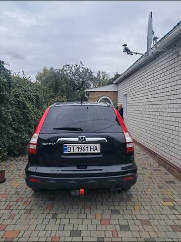 Черный Хонда СРВ, объемом двигателя 2.4 л и пробегом 370 тыс. км за 10000 $, фото 2 на Automoto.ua