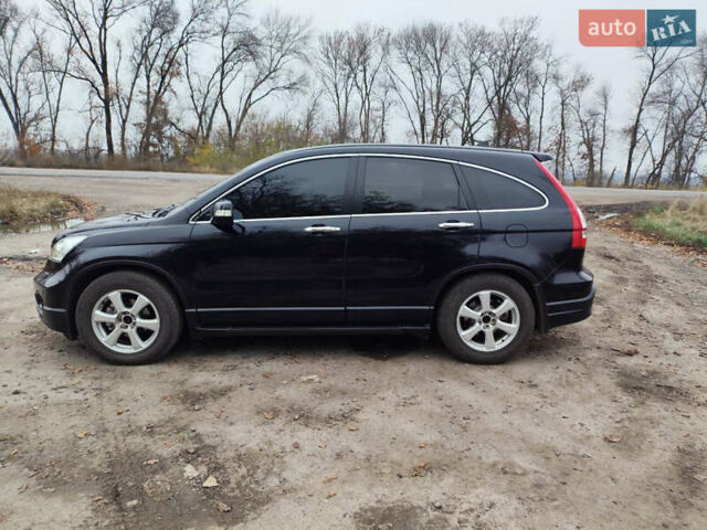 Чорний Хонда СРВ, об'ємом двигуна 2 л та пробігом 276 тис. км за 10300 $, фото 1 на Automoto.ua