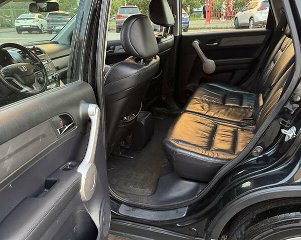 Черный Хонда СРВ, объемом двигателя 2 л и пробегом 173 тыс. км за 9900 $, фото 2 на Automoto.ua