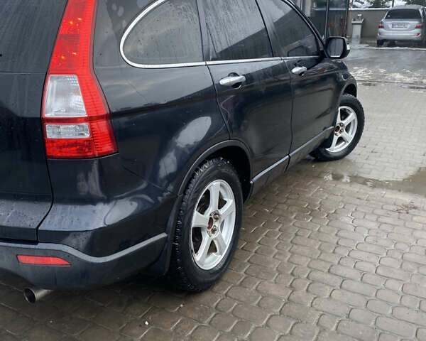 Черный Хонда СРВ, объемом двигателя 2 л и пробегом 251 тыс. км за 9500 $, фото 2 на Automoto.ua