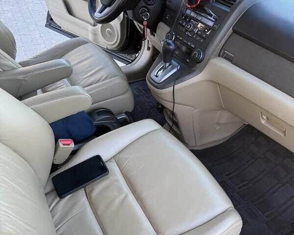 Черный Хонда СРВ, объемом двигателя 2 л и пробегом 172 тыс. км за 10500 $, фото 2 на Automoto.ua