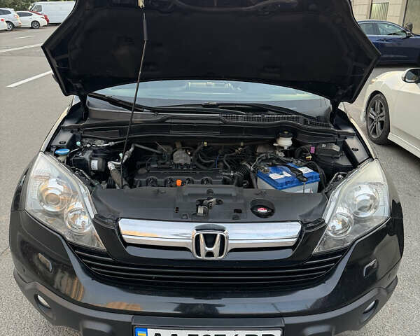 Черный Хонда СРВ, объемом двигателя 2 л и пробегом 173 тыс. км за 9900 $, фото 4 на Automoto.ua