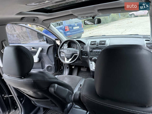 Черный Хонда СРВ, объемом двигателя 2.35 л и пробегом 124 тыс. км за 12000 $, фото 15 на Automoto.ua