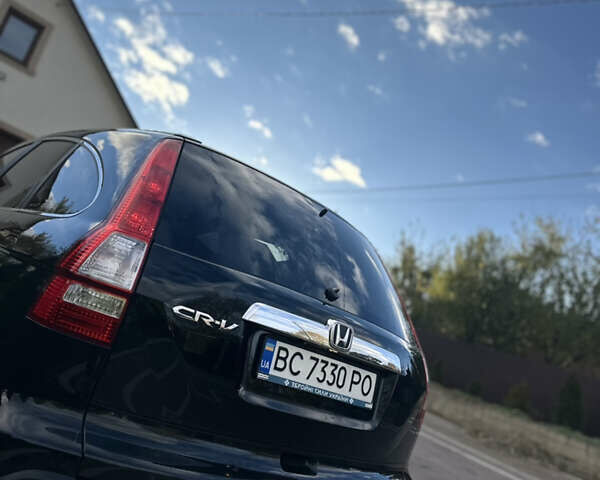 Черный Хонда СРВ, объемом двигателя 2.4 л и пробегом 257 тыс. км за 7950 $, фото 8 на Automoto.ua