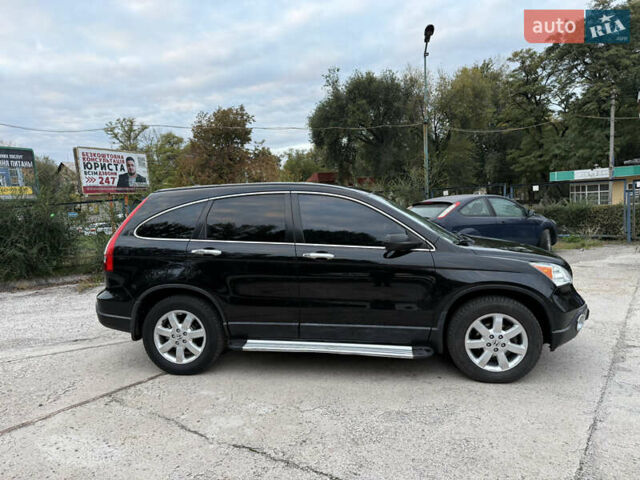 Черный Хонда СРВ, объемом двигателя 2.35 л и пробегом 124 тыс. км за 12000 $, фото 2 на Automoto.ua