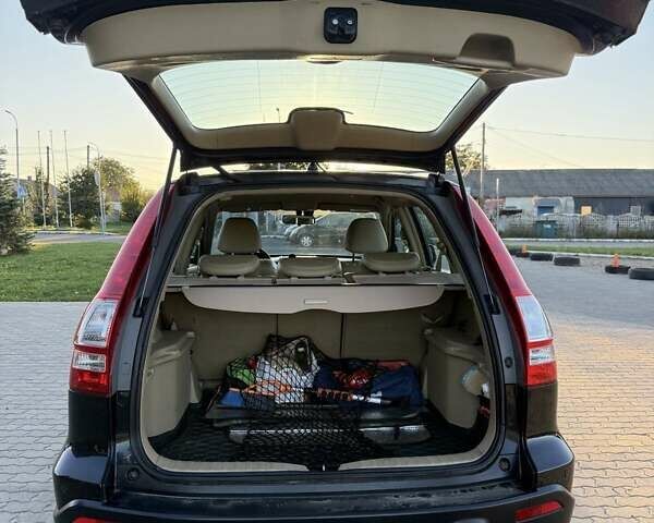 Черный Хонда СРВ, объемом двигателя 2 л и пробегом 172 тыс. км за 10500 $, фото 5 на Automoto.ua